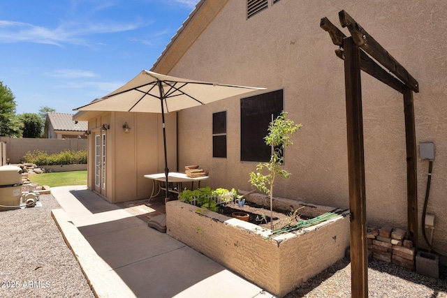 2069 E Winchester Way, Chandler, AZ 85286 - view of patio with a vegetable garden