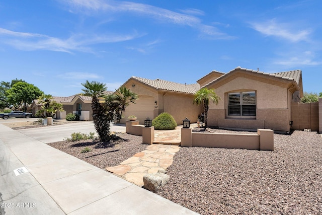 2069 E Winchester Way, Chandler, AZ 85286 - view of front of property with stucco siding, driveway, a tiled roof, and a garage