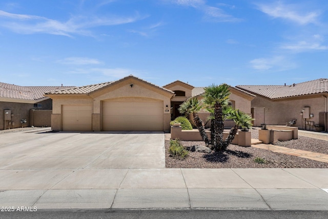 2069 E Winchester Way, Chandler, AZ 85286 - mediterranean / spanish home featuring an attached garage, stucco siding, driveway, and a tile roof