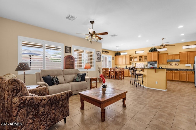 2069 E Winchester Way, Chandler, AZ 85286 - living area with a ceiling fan, light tile patterned floors, and recessed lighting