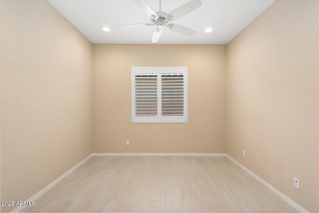 empty room featuring ceiling fan, baseboards, and recessed lighting