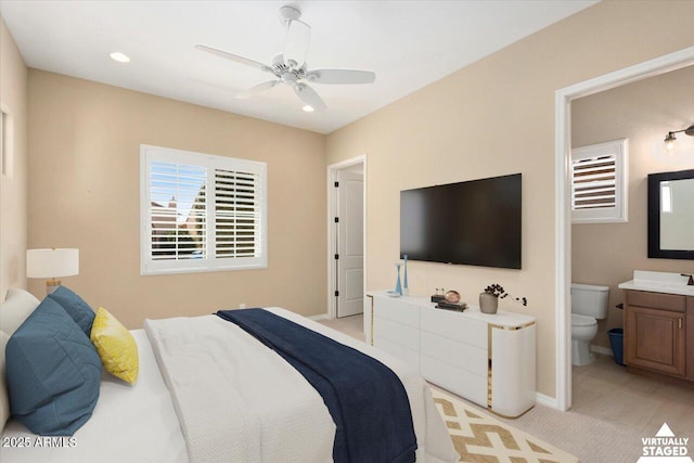 bedroom with ceiling fan, recessed lighting, connected bathroom, and baseboards