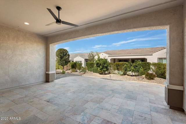 view of patio with ceiling fan