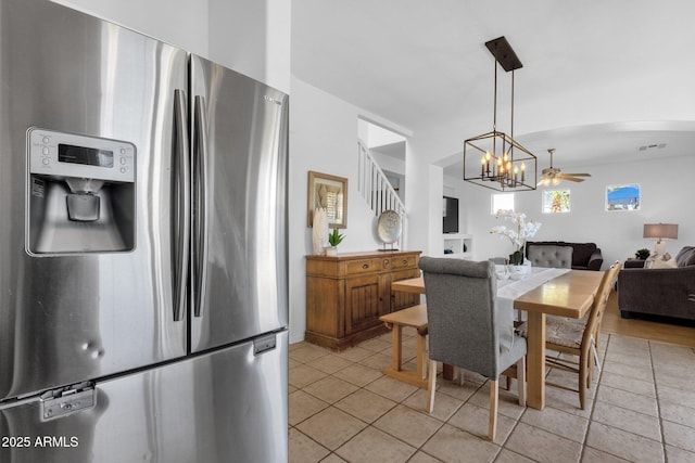 2545 E Harrison Ct, Gilbert, AZ 85295 - dining space with a chandelier, ceiling fan, stairs, and light tile patterned floors