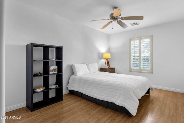 2545 E Harrison Ct, Gilbert, AZ 85295 - bedroom with wood finished floors and ceiling fan