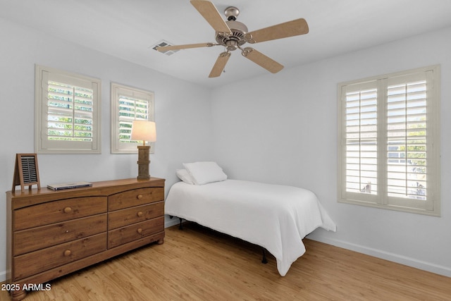 2545 E Harrison Ct, Gilbert, AZ 85295 - bedroom featuring light wood-style flooring and a ceiling fan