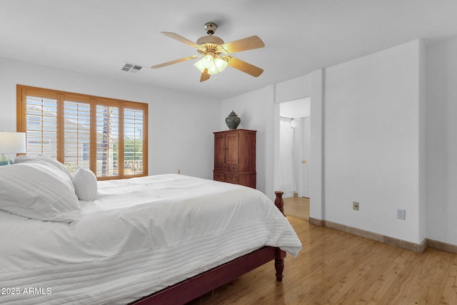 2545 E Harrison Ct, Gilbert, AZ 85295 - bedroom with light wood finished floors and a ceiling fan