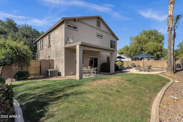 2545 E Harrison Ct, Gilbert, AZ 85295 - back of property featuring stucco siding, a patio, and a fenced backyard