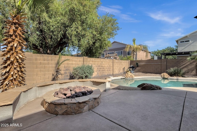 2545 E Harrison Ct, Gilbert, AZ 85295 - fenced backyard with a fire pit and a patio