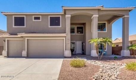 view of front of property with a garage