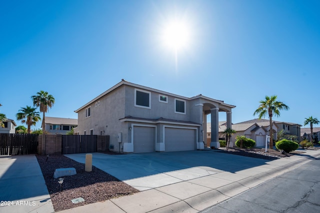 view of front of home with a garage