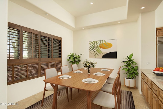 dining area with light tile patterned floors