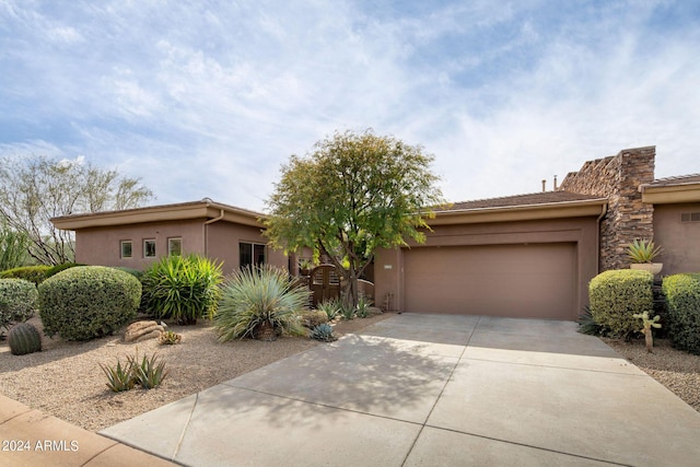 view of front of home with a garage