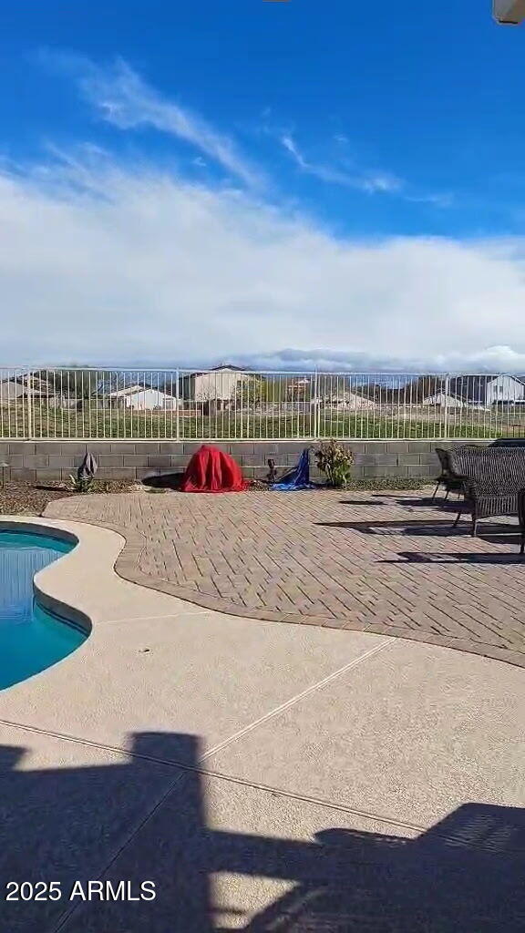 5708 E Sunrise Cir, Florence, AZ 85132 - view of pool featuring fence, a patio area, and a fenced in pool