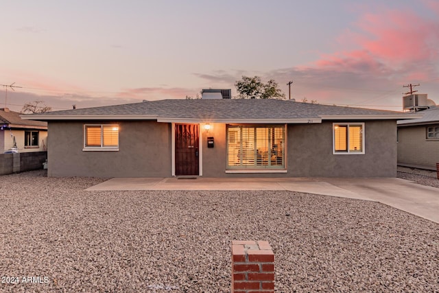 ranch-style house with a patio