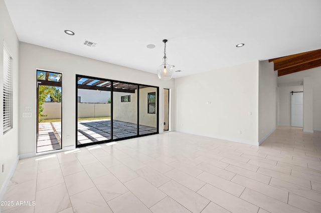 empty room featuring beamed ceiling, recessed lighting, visible vents, and baseboards