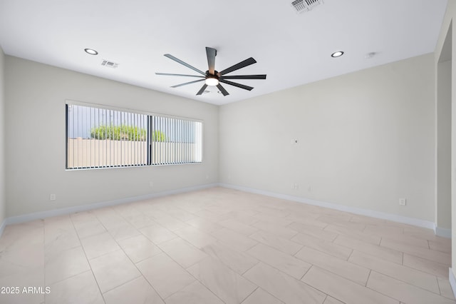 unfurnished room featuring visible vents, recessed lighting, baseboards, and a ceiling fan