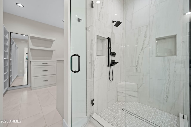 full bath with a marble finish shower