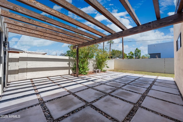 view of patio / terrace featuring a pergola and a fenced backyard