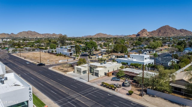 birds eye view of property featuring a mountain view and a residential view