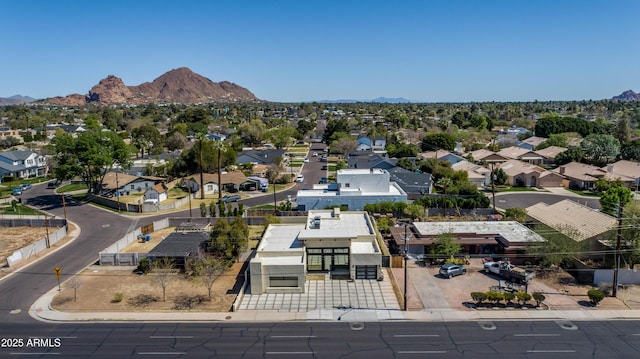 aerial view featuring a mountain view and a residential view