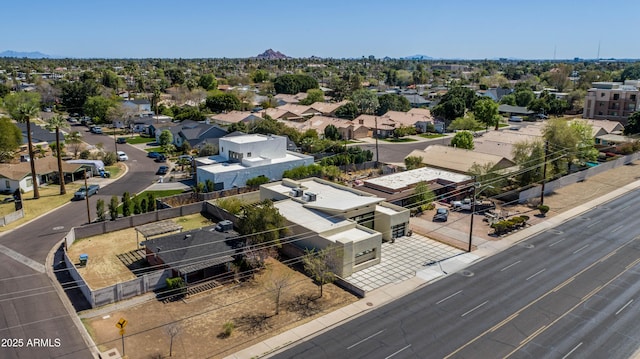 birds eye view of property with a residential view