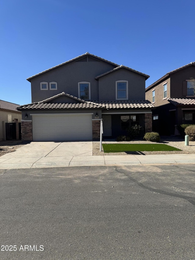 view of front of home with a garage