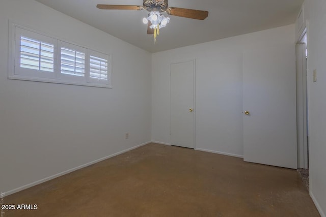 unfurnished bedroom featuring concrete floors and ceiling fan