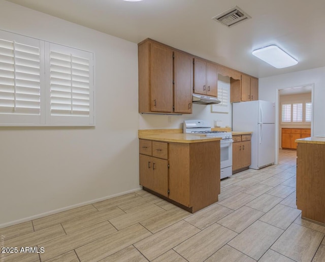 kitchen featuring white appliances