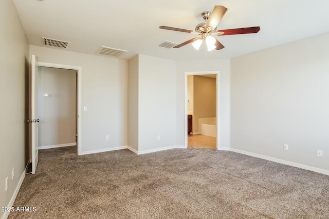 24479 W Mobile Ln, Buckeye, AZ 85326 - unfurnished bedroom featuring carpet and visible vents