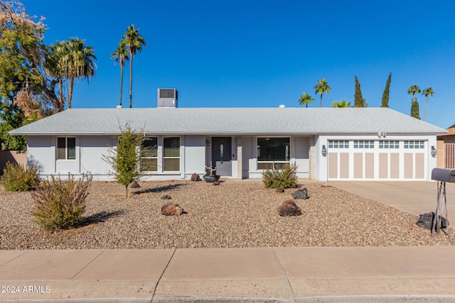 single story home featuring a garage