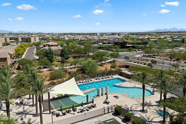 2821 E Cashman Dr, Phoenix, AZ 85050 - bird's eye view of a pool and a mountain backdrop