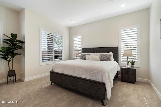 2821 E Cashman Dr, Phoenix, AZ 85050 - bedroom featuring light colored carpet, baseboards, and recessed lighting