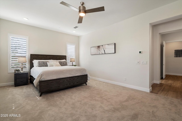 2821 E Cashman Dr, Phoenix, AZ 85050 - bedroom with light colored carpet, baseboards, a ceiling fan, and recessed lighting
