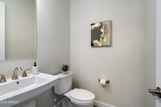 2821 E Cashman Dr, Phoenix, AZ 85050 - bathroom featuring a sink and toilet