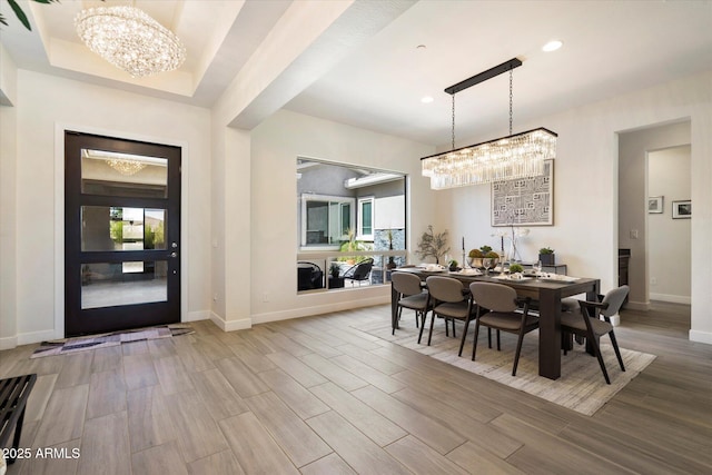 2821 E Cashman Dr, Phoenix, AZ 85050 - dining room with a chandelier, baseboards, wood finished floors, plenty of natural light, and recessed lighting