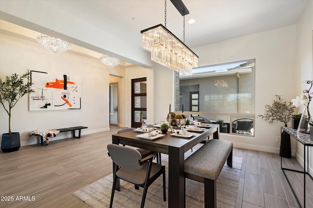 2821 E Cashman Dr, Phoenix, AZ 85050 - dining room with a chandelier, wood finished floors, baseboards, and recessed lighting