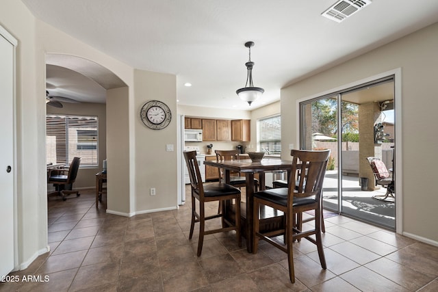 dining room with tile patterned flooring