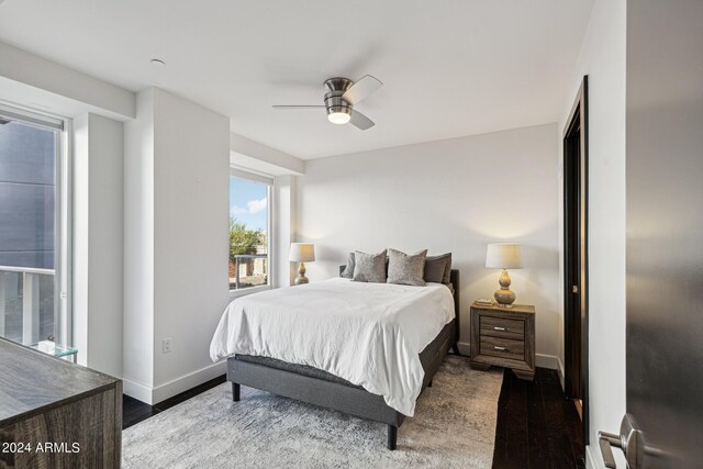 bedroom featuring ceiling fan and wood-type flooring