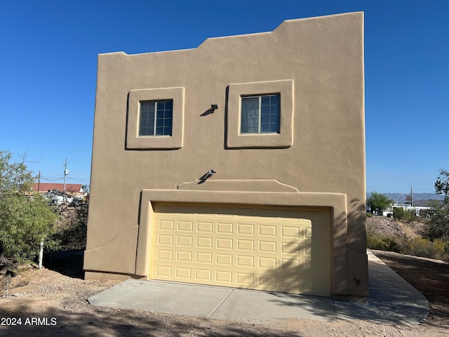 view of front of home featuring a garage