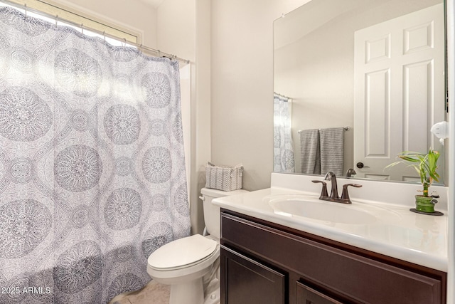 bathroom with vanity, toilet, and a shower with curtain