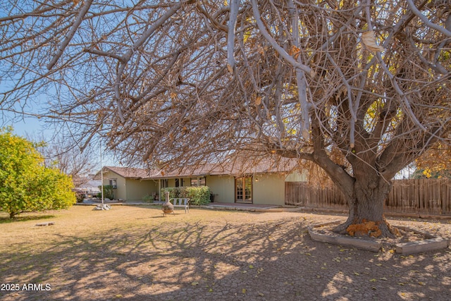 rear view of house featuring a patio area