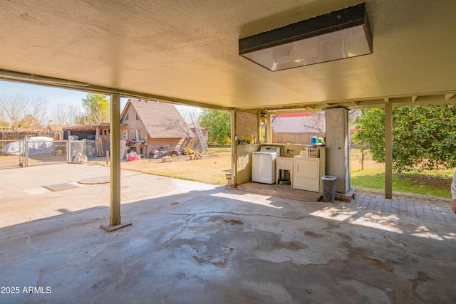 view of patio with washer and dryer and exterior kitchen