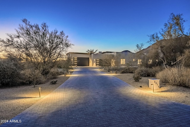 view of front of house featuring a mountain view and a garage