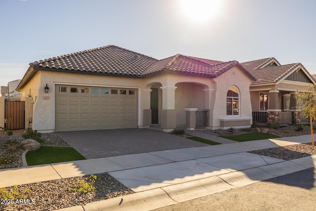 mediterranean / spanish-style house featuring a garage