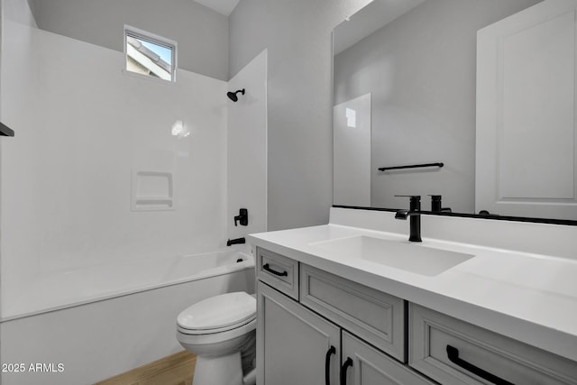 full bathroom featuring vanity, shower / bathtub combination, and toilet