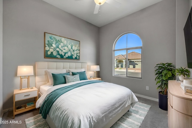 bedroom with ceiling fan and carpet