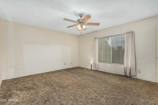 empty room with carpet floors, a textured ceiling, and ceiling fan