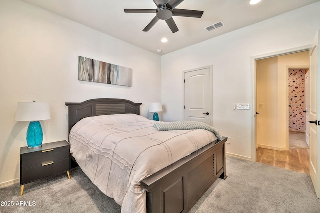 bedroom featuring recessed lighting, light colored carpet, visible vents, ceiling fan, and baseboards