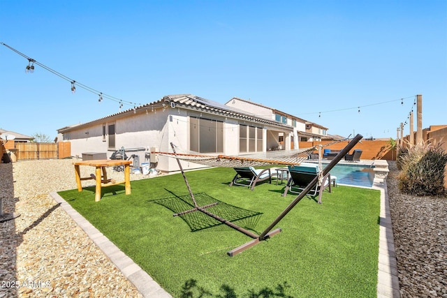 view of yard with a patio area and a fenced backyard